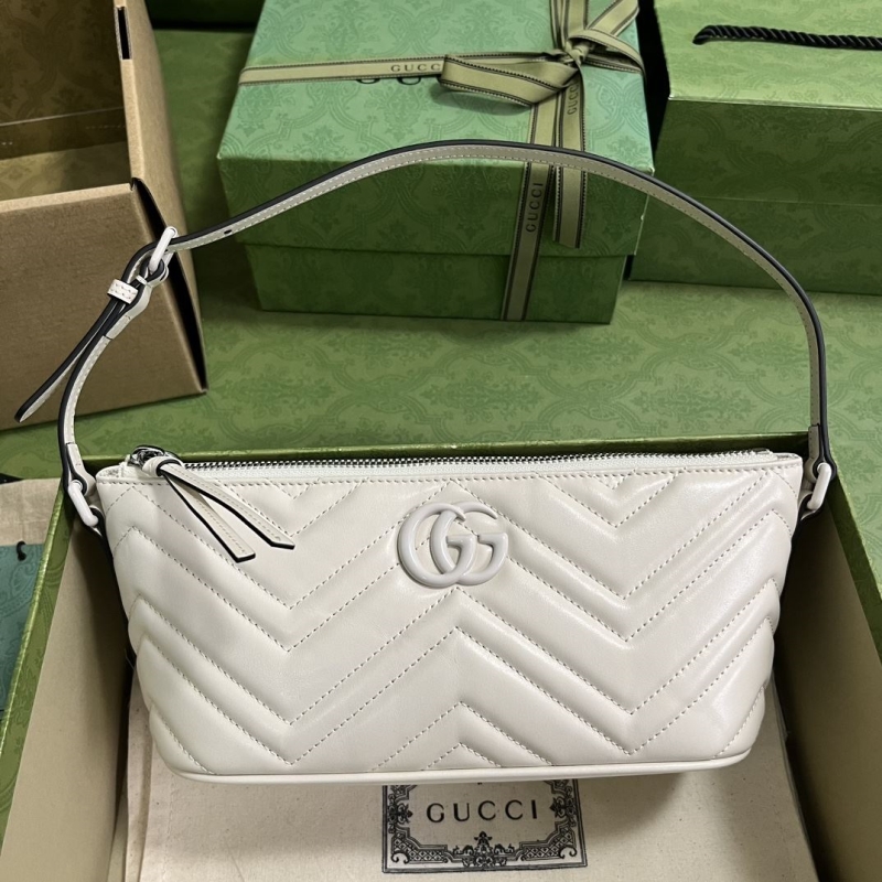 G*u*i top handle bags